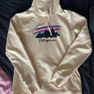 Patagonia Cream Hoodie, Size Small in women’s.